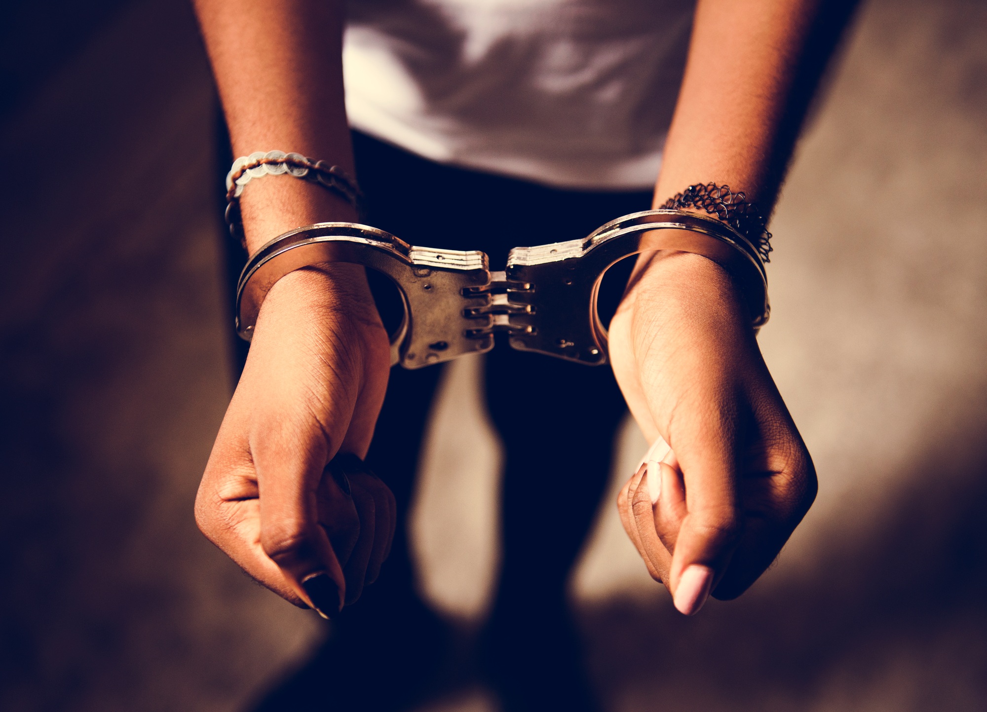 Prisoner with handcuffs on hands